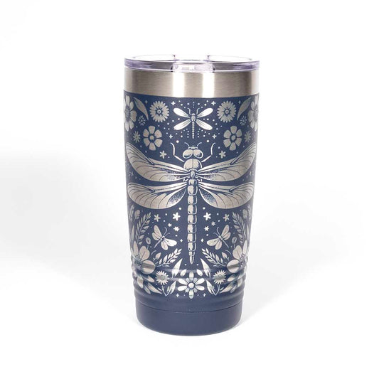 Navy blue 20 ounce tumbler with floral and dragonfly design on a stainless steel background - side 1