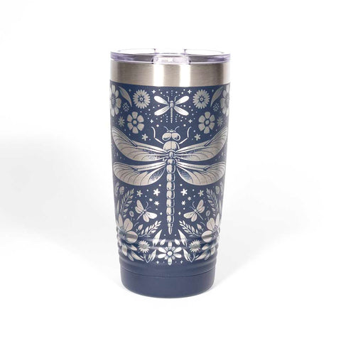 Navy blue 20 ounce tumbler with floral and dragonfly design on a stainless steel background - side 1