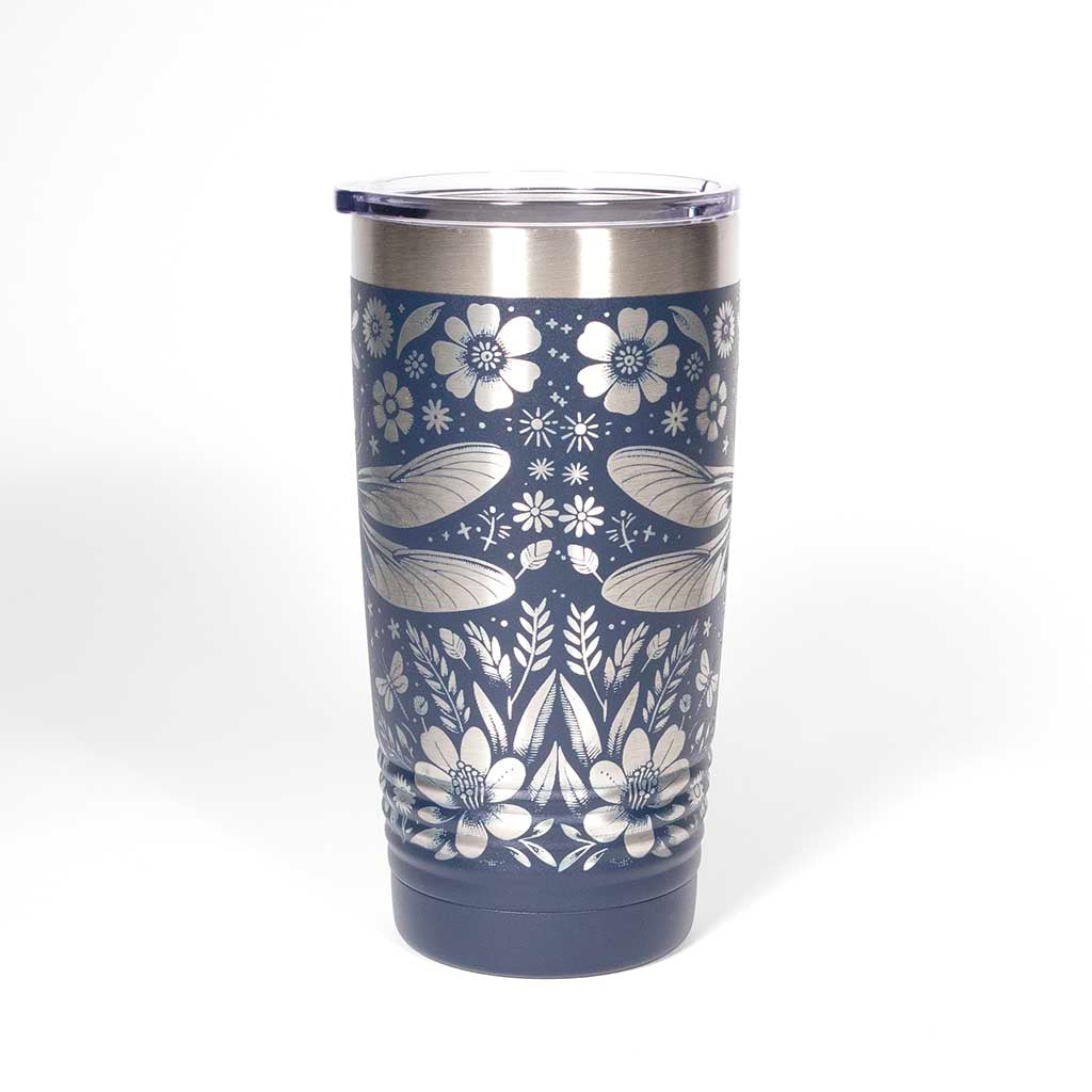 Navy blue 20 ounce tumbler with floral and dragonfly design on a stainless steel background - side 4