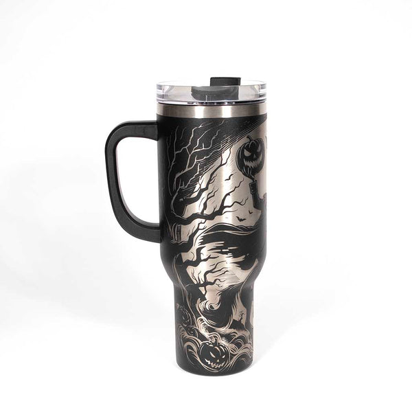 This is a black 40 ounce tumbler with a screw on lid with a drinking hole access and a straw. The laser engraving is of a headless horseman on his trusty steed. Side 1