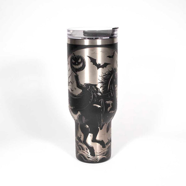 This is a black 40 ounce tumbler with a screw on lid with a drinking hole access and a straw. The laser engraving is of a headless horseman on his trusty steed. Side 2