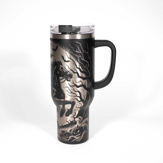 This is a black 40 ounce tumbler with a screw on lid with a drinking hole access and a straw. The laser engraving is of a headless horseman on his trusty steed. Side 3