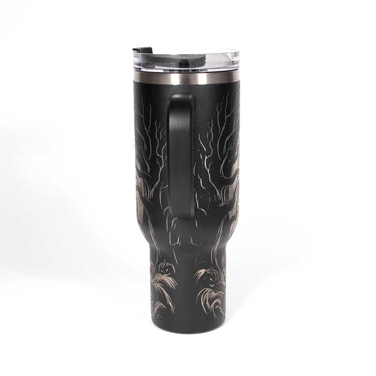 This is a black 40 ounce tumbler with a screw on lid with a drinking hole access and a straw. The laser engraving is of a headless horseman on his trusty steed. Side 4
