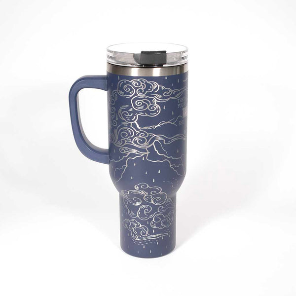 Blue 40 ounce tumbler with motivational quote on a stainless steel background. Side 2