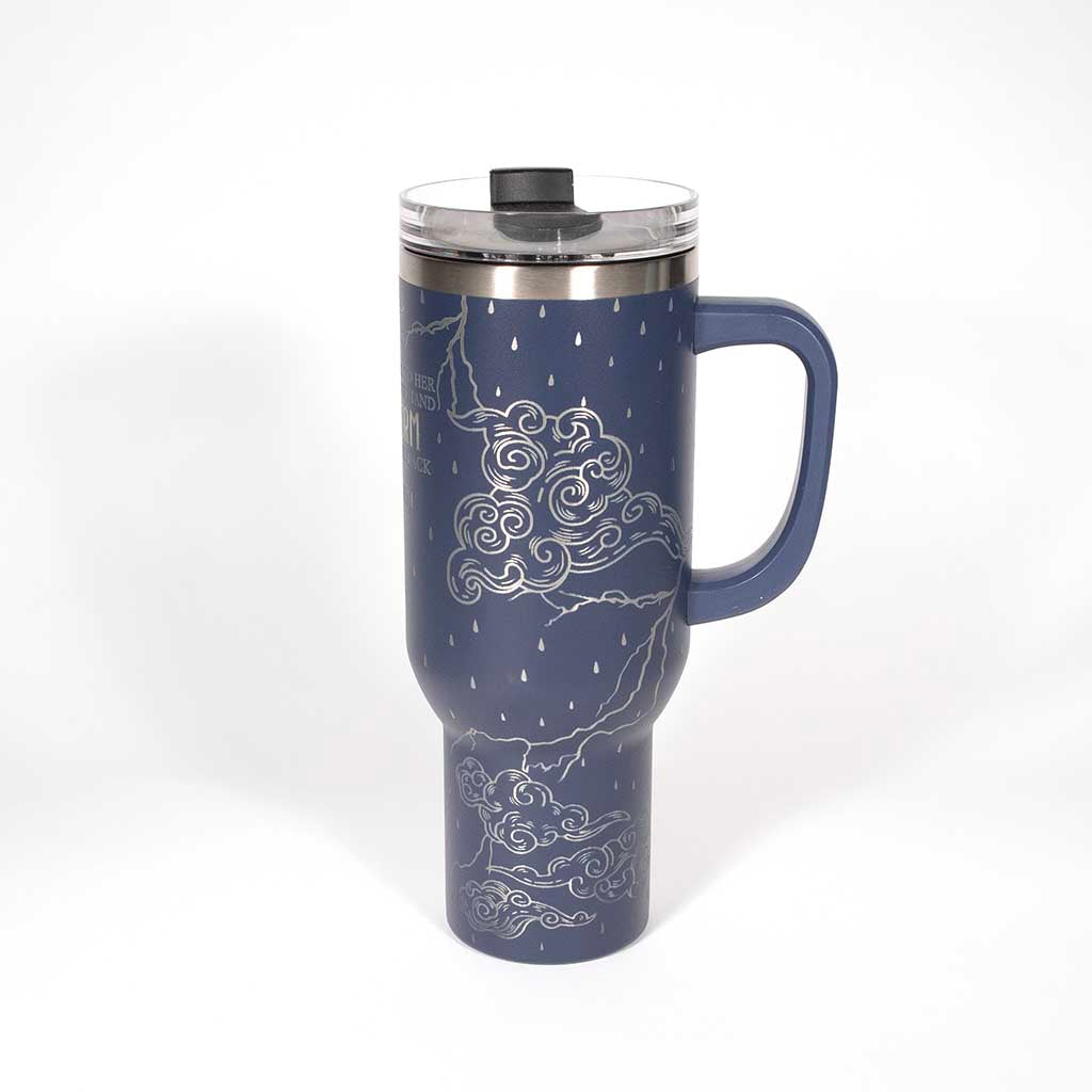 Blue 40 ounce tumbler with motivational quote on a stainless steel background. Side 2
