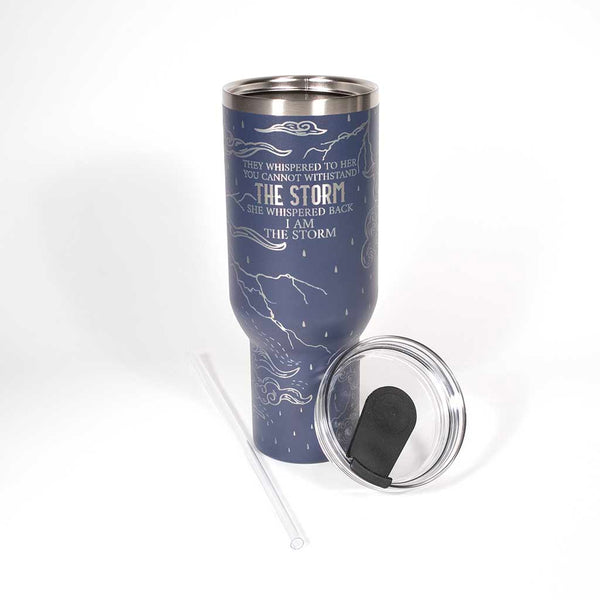 Blue 40 ounce tumbler with motivational quote on a stainless steel background. Shown with straw and the cover off. 