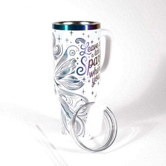 40 ounce travel mug with a fairy design on a white background. Showing with lid off and included straw.
