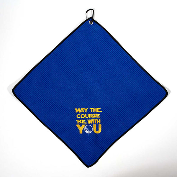 Blue towel with yellow text and golf ball graphic on a white background