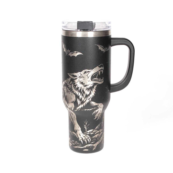 40 ounce travel mug with a werewolf, bats and a gothic cathedral design on a black background. Side 1