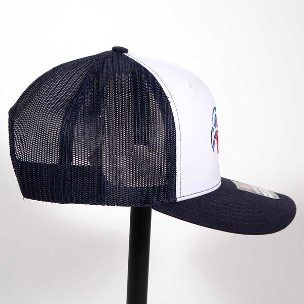 This is a Richardson 112 snap back hat with the outline of an eagles head. The head has been embroidered in blue and red stitching. From the right side. 