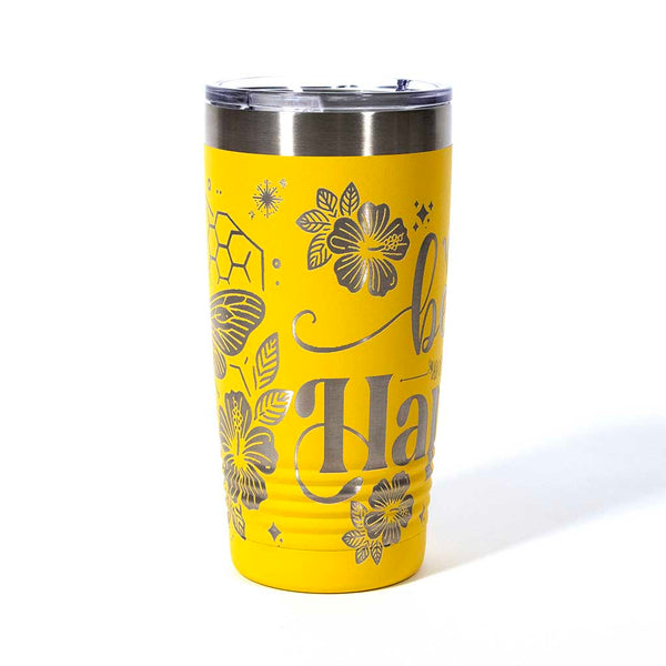 Yellow powder coated 20 ounce stainless steel tumbler. Engraved with flowers, a honeycomb and a bee with the words "Bee Happy". Side 3