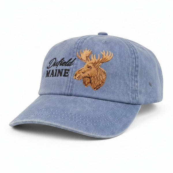 Dailey Woodworking blue garment-washed cotton dad hat featuring a detailed embroidered moose and Dixfield Maine text.