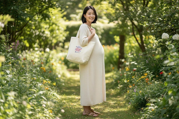 Dailey Woodworking natural canvas tote bag with embroidered text "It's Not Hoarding If It's Yarn" and yarn graphic.