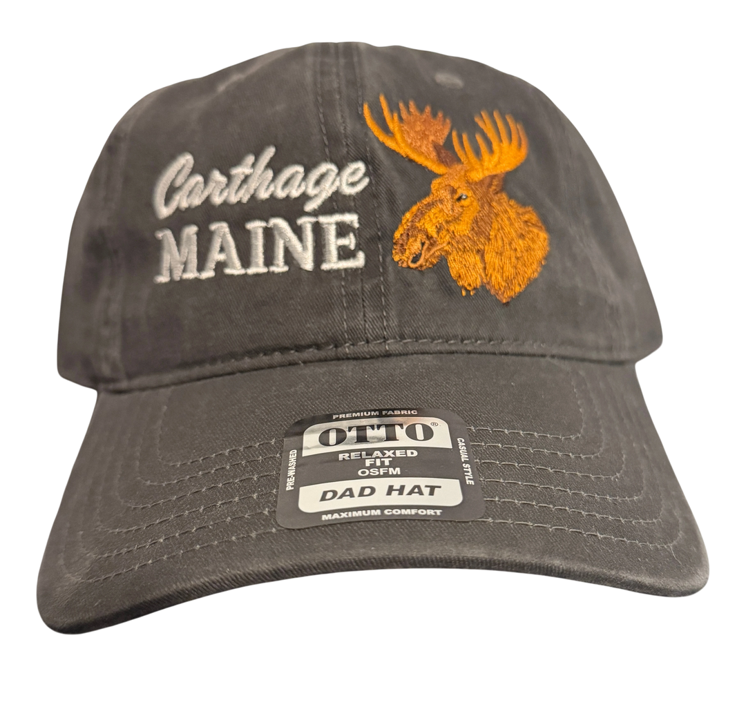 Dailey Woodworking charcoal grey dad hat featuring an embroidered bull moose and Carthage, Maine text on the front.