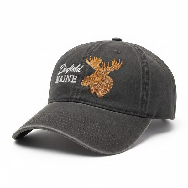 Dailey Woodworking charcoal garment-washed cotton dad hat featuring an embroidered bull moose and Dixfield Maine text