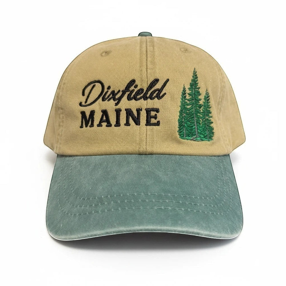 Dailey Woodworking unstructured cotton hat in tan and sage green with Dixfield Maine pine tree embroidery.