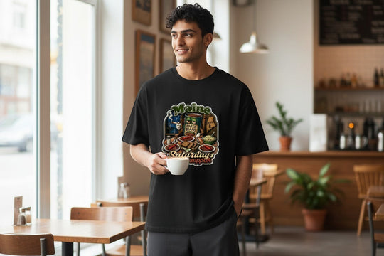 Dailey Woodworking black short sleeve t-shirt with a humorous Maine baked beans supper graphic. Cotton-poly blend.