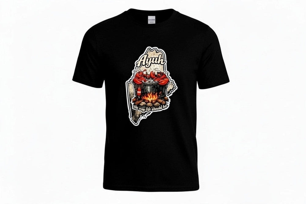 Black t-shirt with a graphic of the state of Maine containing a lobster pot over a fire with lobsters sitting inside and the words "Ayuh" and "The way life should be"