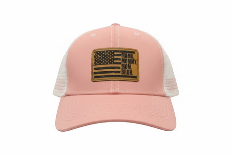 Dailey Woodworking dusty rose trucker hat with white mesh back and leather patch reading "Mama. Mommy. Mom. Bruh."