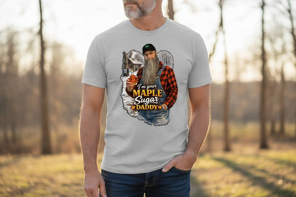Dailey Woodworking light grey short sleeve t-shirt with a graphic of a bearded man in overalls holding a maple leaf, saying "I'm your Maple Sugar Daddy".