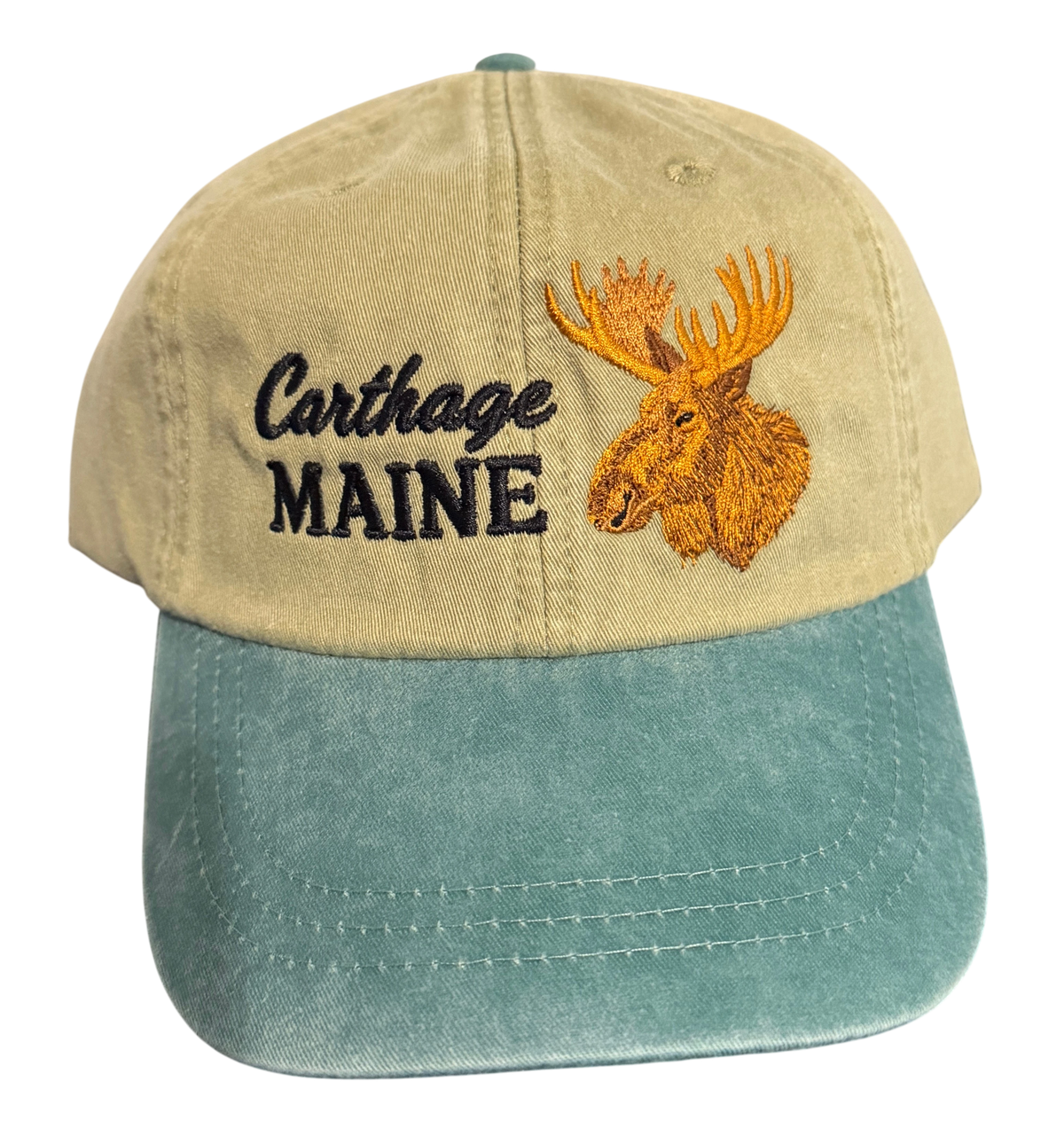 Dailey Woodworking Carthage Maine moose embroidered dad hat in vintage tan and teal garment-washed cotton.