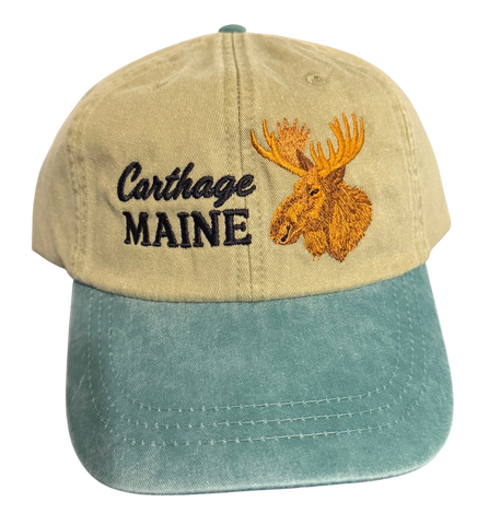 Dailey Woodworking Carthage Maine moose embroidered dad hat in vintage tan and teal garment-washed cotton.