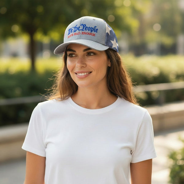 Dailey Woodworking trucker hat with heather grey front, stars-and-stripes mesh back, and patriotic embroidery.