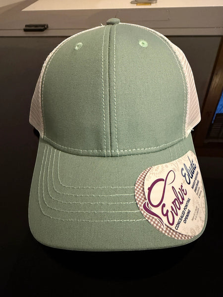 Dailey Woodworking seafoam green and white mesh ponytail trucker hat with pre-curved visor and Evolve brand tag