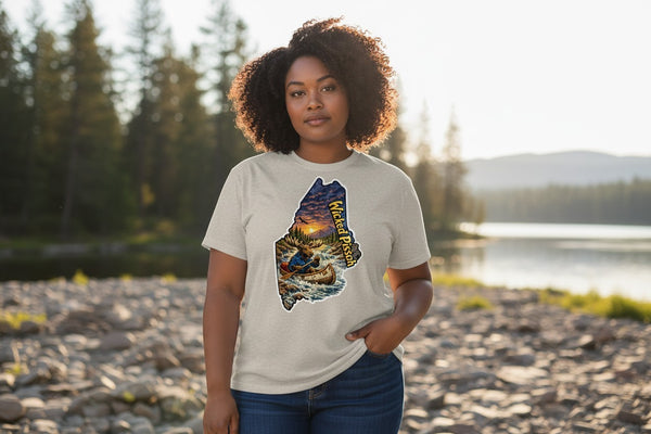 Dailey Woodworking light grey short sleeve t-shirt with a graphic of Maine featuring a moose in a canoe, sunset, and "Wicked Pissah" text.