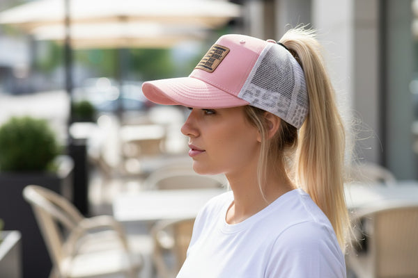 Dailey Woodworking dusty rose trucker hat with white mesh back and leather patch saying "Mama. Mommy. Mom. Bruh."