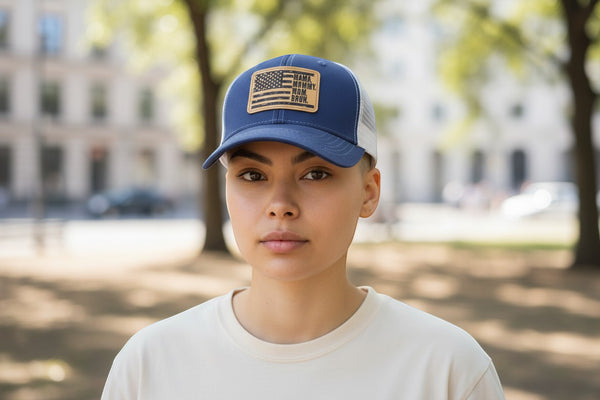 Dailey Woodworking navy blue trucker hat with white mesh back and leather patch reading "Mama. Mommy. Mom. Bruh."