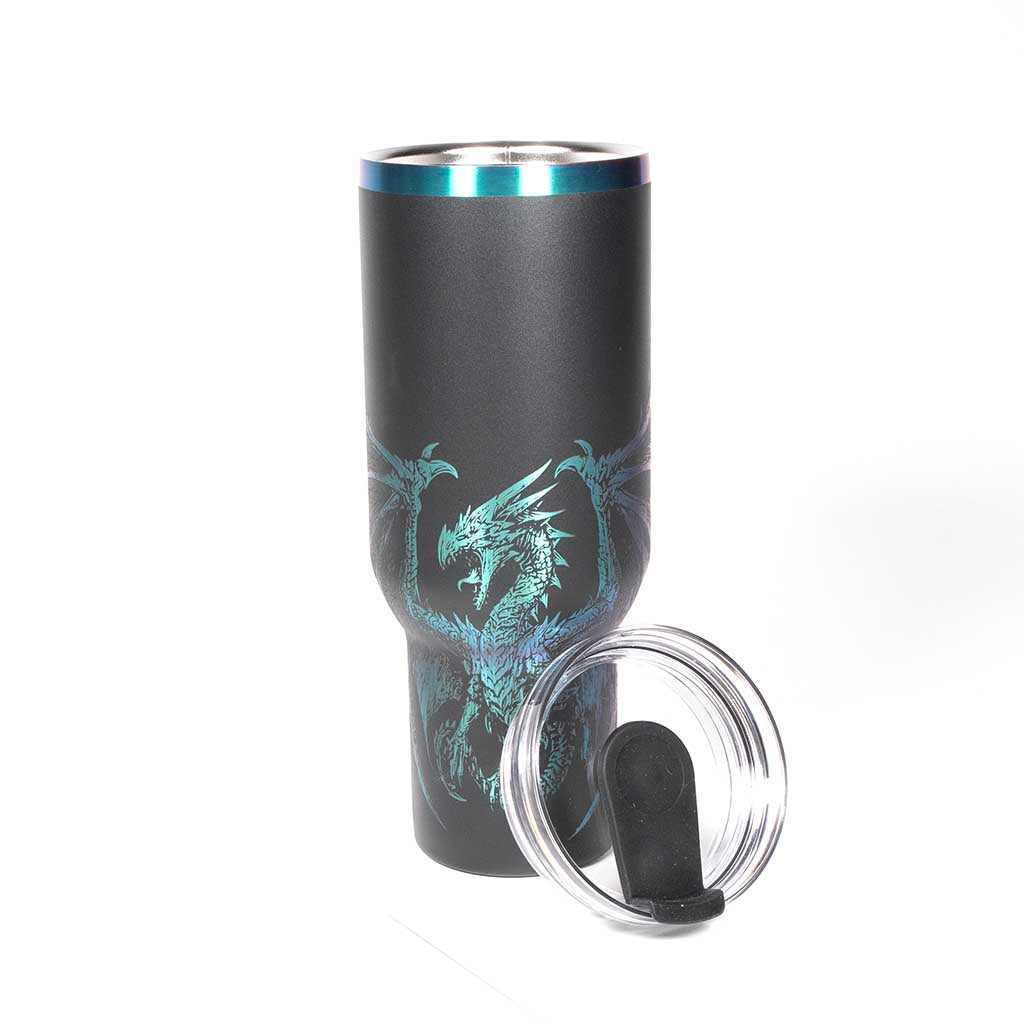 40 ounce Black tumbler with a dragon design engraved on a holographic background. Shown with cover off and straw beside the tumbler. 