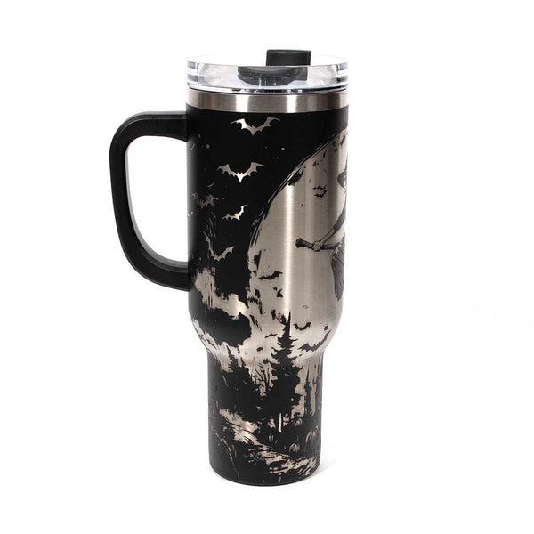 This is a black 40 ounce tumbler with a screw on lid with a drinking hole access and a straw. The laser engraving is of a witch flying on her broom above a home and pumpkin patch. Side 2