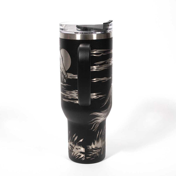 This is a black 40 ounce tumbler with a screw on lid with a drinking hole access and a straw. The laser engraving is of a majestic wild horse running through the night. 