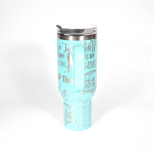 Seafoam 40 ounce travel mug with funny golf sayings and images of a female golfer. Side 4