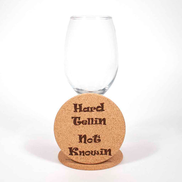 4 inch cork coaster with "Hard Tellin Not Knowin" laser engraved on the top, view 2 - Dailey Woodworking