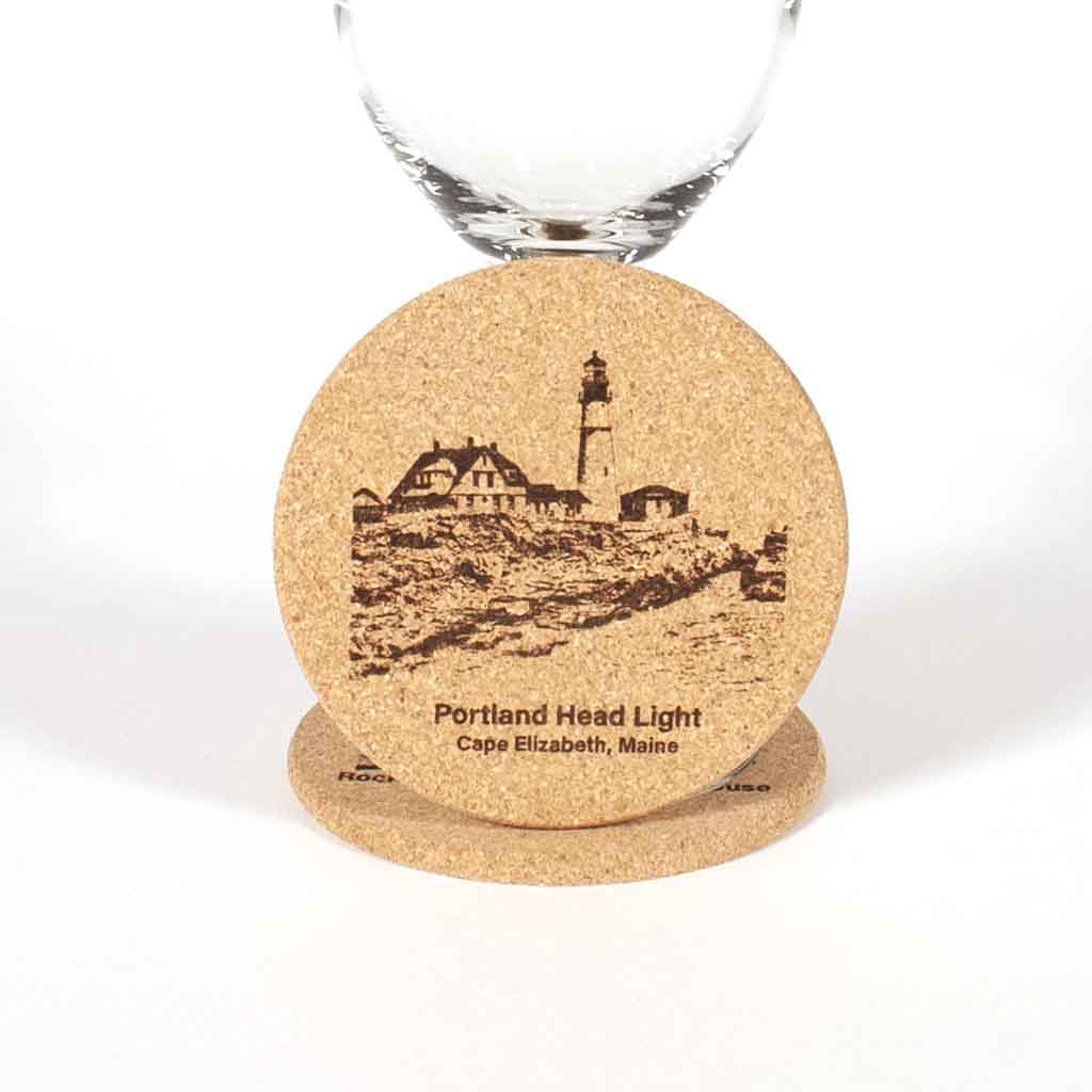Cork Coaster with image of Portland Head Light engraved on it, close up - Dailey Woodworking