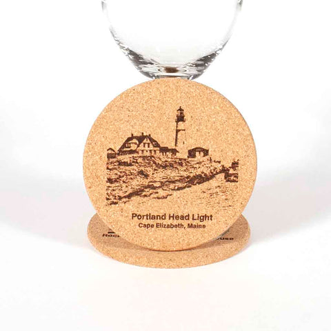 Cork Coaster with image of Portland Head Light engraved on it, close up - Dailey Woodworking